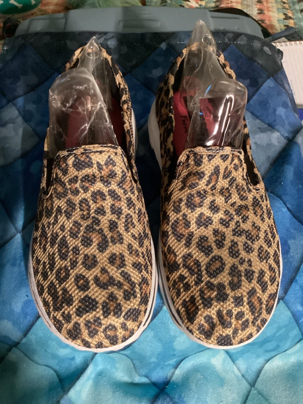 Skechers Leopard Print Slip-On Sneakers in Tan and Black